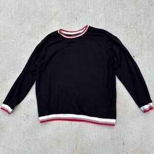 Elegant Black Sweater with Red and White Trim